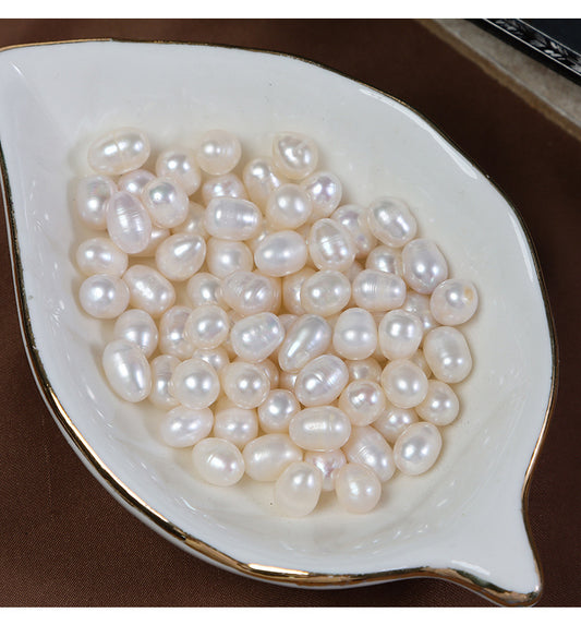 Close-up of ridged oval freshwater pearls with soft white luster