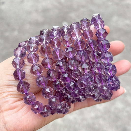 Brazilian 7A grade amethyst beads with round faceted cut, ideal for jewelry making.