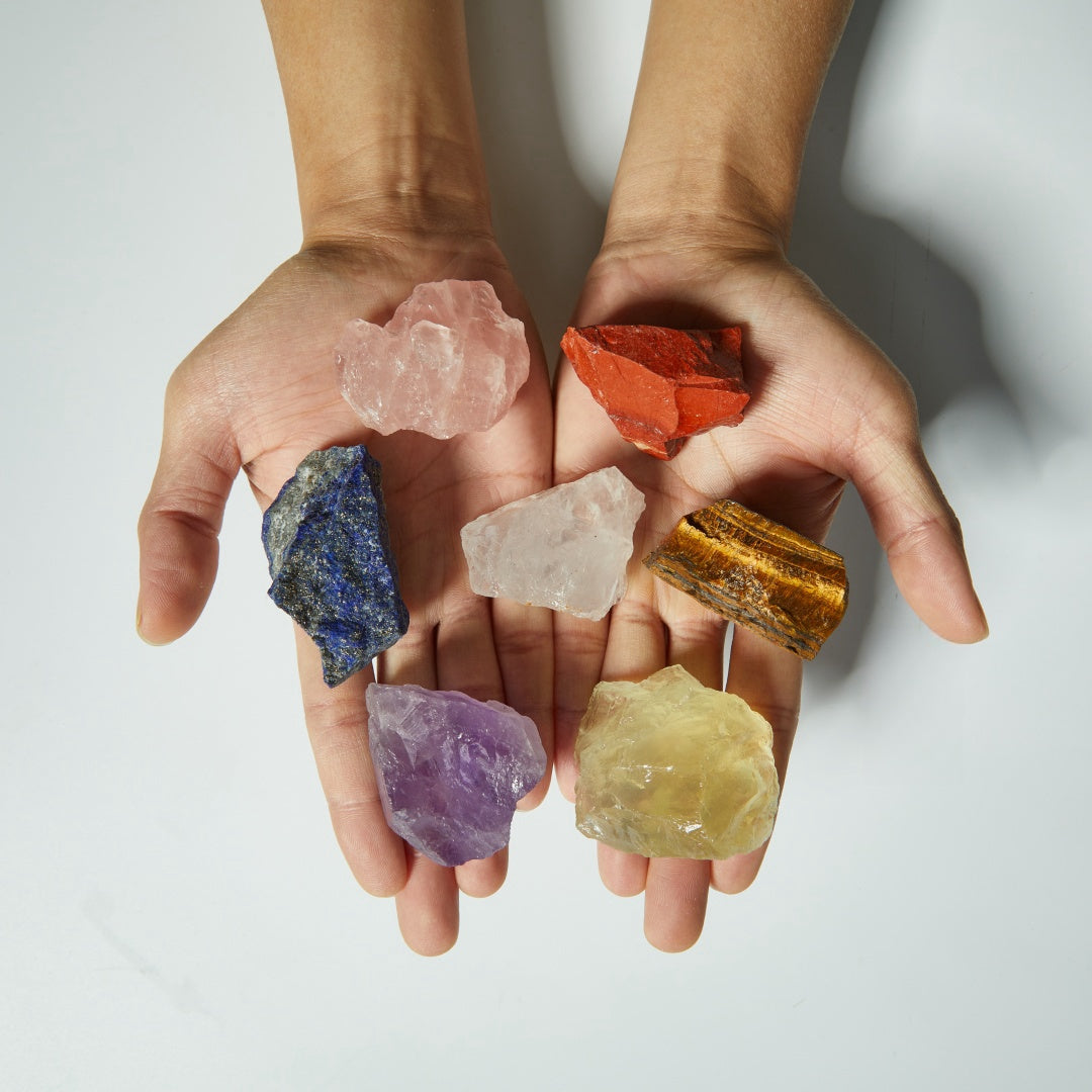 Crystal gift box open with chakra guide held in hand – complete set view