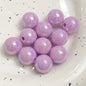 Colorful glossy round acrylic beads in 10–16mm for DIY use