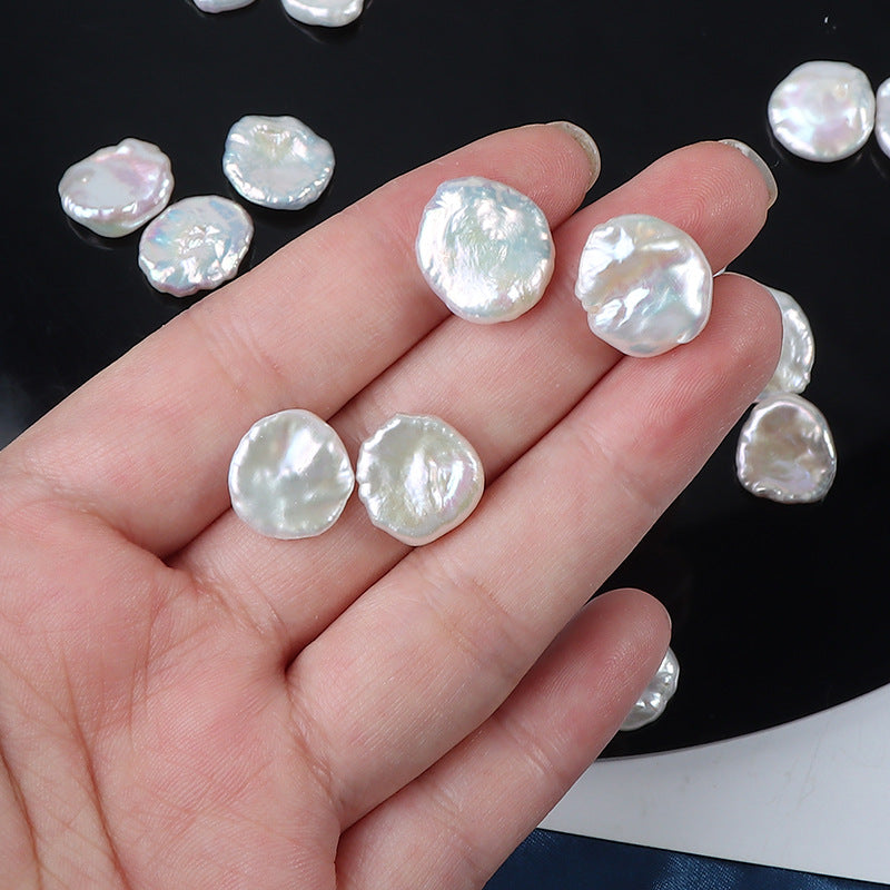 Close-up of petal pearls in hand showing size and luster