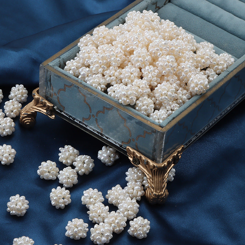 Handmade flower ball with freshwater pearls on satin